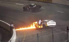 Both bourque and his riding mechanic harry holcomb were trapped under the car and on lap twelve, one of the front wheels came off the american simplex car greiner was driving, causing him to lose control and both men to be thrown. Video Hero Dad Pulls Son From Burning Racing Car