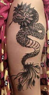 Cool tattoos body art tattoos tattoos traditional tattoo bottle tattoo color tattoo leg tattoos beautiful tattoos tattoo designs. Scary Snake Tattoose On The Leg Amazing Snake Tattoo Designs Tattoo Kits Tattoo Machines Tattoo Suppliesa Wormhole Tattoo Supply Best Snake Tattoos Done By Top Tattoo Artists From Around The World