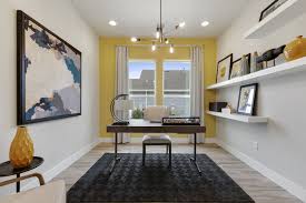 Lemon Yellow Home Office With Floating Shelves Yellow Home Offices Yellow Accent Walls Home