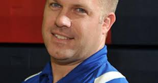 Christiana wrestling coach follows in father's footsteps