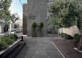 Choose a flooring type that fits your budget, suits the climate you live in, and accommodates the. Dream Rooftop Terrace Garden Filled With Beautiful Plants And Shrubs Modern Feeling With Grey Patio Slabs Outdoor Flooring Concrete Look Tile Outdoor Tiles