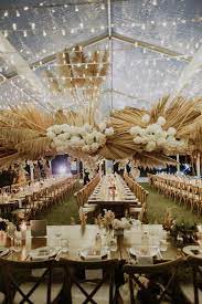 Pampas Grass Wedding Ideas For The Boho Glam Bride Grass Wedding Wedding Ceiling Tent Wedding Reception