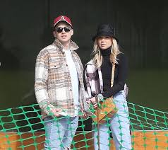 AJ Pritchard's girlfriend Abbie Quinnen covers up in a turtleneck top after  fire accident