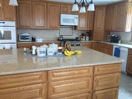 Rl to help me spiffy up our kitchen a bit! Honey Oak Kitchen Cabinets With White Countertops Decorkeun