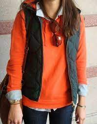 Pin By Pilar Acosta On Moda Chalecos Cool Outfits Orange Sweater Outfit Puffy Vest Outfit
