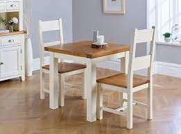 If you're new to buying your dining tables and chairs online, we're here to answer any questions you. Country Oak 80cm Cream Oak Table Pair Of Matching Cream Oak Chairs Compact Dining Set