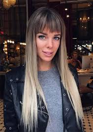 Start parting the hair from one arch of the eyebrow to the other arch of the eyebrow and not going any wider than that, roszak says. 55 Long Haircuts With Bangs For 2021 Tips For Wearing Fringe Hairstyles