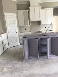 I need help with requisite gray! Requisite Gray Moderne White Pearled White Cabinets And Gris Morado Island White Cabinets Cabinet Kitchen Cabinets