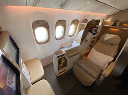 First class consists of 2 rows of closed suites per 4 in each. Video Review Emirates New Business Class For Boeing 777 Aeronews Global