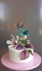 Kids cake cake fondant cakes novelty cakes pretty birthday cakes birthday cake girls birthday cake with flowers 1st birthday cakes cake decorating. Flowers And Butterfly S Cake By Unusual Cakes For You Cakesdecor