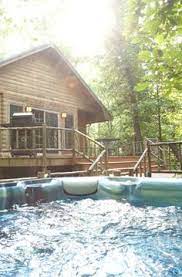 The elevated decks feature a hot tub, patio table, and gas grill. 7 Travel Il Ideas Travel Southern Illinois Illinois Travel
