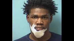 Charges: Cop feared for his life during struggle for gun with suspect