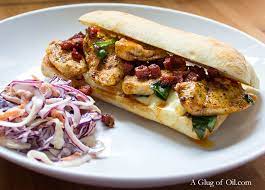 Ciabatta With Chicken Chorizo Red Pepper And Melted Cheese A Glug Of Oil