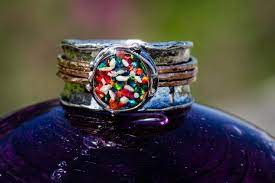 Cremation glass keepsakes and urns. Two Tone Spin Ring Spirit Pieces Memorial Glass Jewelry