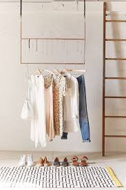 Clothing rods are metal, wood, or plastic bars that you can use to hang clothes, like a rod you would find in a traditional closet. Ceiling Clothing Rack Clothing Rack Hanging Clothes Garment Racks