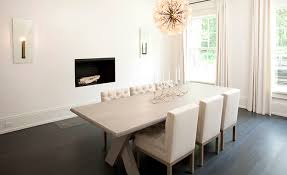 Dark wood panels floor dining room blue wall art on beige. Contemporary Dining Room With X Based Dining Table Contemporary Dining Room