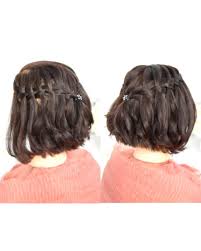 Raccolto con treccia per bambina con capelli lunghi. Acconciatura Con Treccia A Cascata Per Capelli Corti