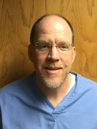 Meet J. Mark Domin, DDS, P. Jeffrey Brooks, DDS, MD, Brant A. Erbentraut,  DDS, Bradley M. Robinson, DDS, MD or J. J. Ooi, DMD, MD