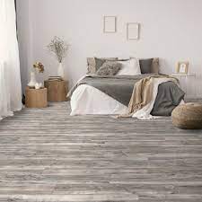 Waterproof vinyl flooring is luxury engineered vinyl that is 100% waterproof. Select Surfaces Southern Gray Spill Defense Laminate Flooring Sam S Club