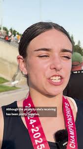 A California transgender athlete shares the podium after earning 2nd place  in the long jump at a state meet.