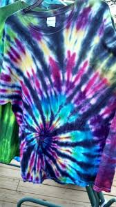 Black And Blue Tie Dye Pattern Black Back Tie Dye With Tulip Dye And Black Rit Dye Fold For A Spiral Pattern Put Colored Dye On One Side Norma Tie Dye Crafts How To Dye Fabric Tie Dye