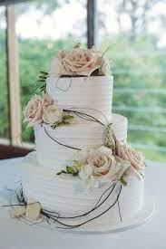 Wedding Cake 3 Tier White Icing Peach And White Flowers Vine Roses Spring Flowers Elegant Wedding Cake Rustic Country Wedding Cakes Cool Wedding Cakes