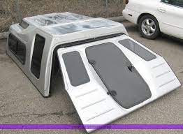 Fiberglass toppers, on the flip side, are created in custom molds in order to make sure they cover the truck bed perfectly. Shadow By Guidon Pickup Bed Topper Item 3004 4 21 2010 Truck Toppers Truck Camper Truck Bed Camping