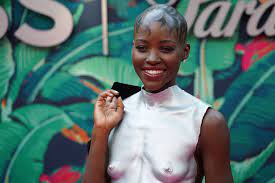 Lupita Nyongo Slays With Epic Abs In Naked Breastplate Top On IG