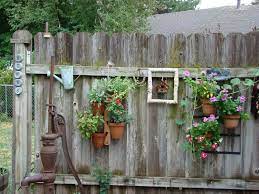 Check spelling or type a new query. 45 Charming Outdoor Hanging Planter Ideas To Brighten Your Yard Rustic Garden Decor Hanging Garden Backyard Garden Landscape