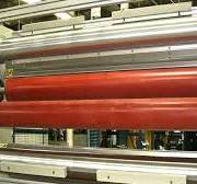 Modifying surface properties in extrusion coating ...