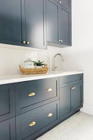 Navy Laundry Room With White Marble Chevron Floor Tiles Transitional Laundry Room Blue Laundry Rooms Kitchen Kitchen Inspirations