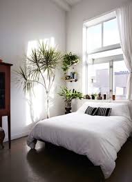 And unlike popular perception, minimal bedrooms also give you ample opportunity to express the classy and luxurious white minimal bedroom is more popular globally than arguably any other bedroom style. This Clean White Bed And Plants On Plants Is So Lovely Minimalist Bedroom Decor Minimalist Bedroom Design Bedroom Design