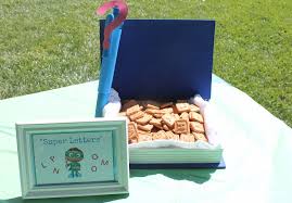 We had wonder red's basket filled with alphabet cereal bars. Tristan S Super Why 3rd Birthday Simply Beautiful By Angela