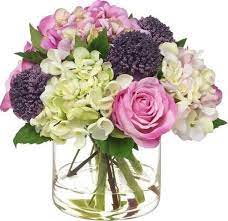 Fake flower arrangements with decorating tips and tricks are the focus of this post. 7 Faux Flowers That Look Impressively Real Fake Flower Arrangements Artifical Flowers Flower Arrangements Diy