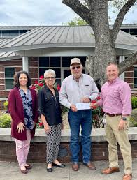 Frankie and Henrietta King give $600 for Work4College