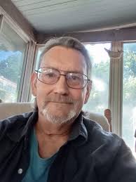 Why is my GMC Envoy's alternator not charging the battery after replacing  the motor mount?