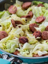 1 head chopped raw cabbage, 1 minced garlic clove, 1 stick salted sweet cream butter, to taste cracked black pepper and salt, 2 rings of polska kielbasa. Cabbage And Kielbasa Skillet Spicy Southern Kitchen