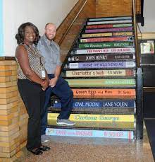 A Very Creative Way To Add Some Color To An Old School Staircase We Added Favorite Children S Book School Stairs Elementary School Books School Library Design