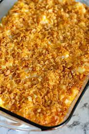 Funeral Potatoes Cheesy Potato Casserole Topped With Corn Flakes Recipe Funeral Potatoes Potato Side Dishes Casserole Side Dishes