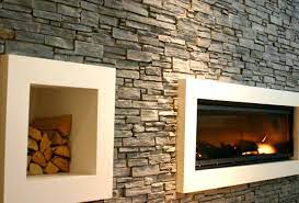 The stacked stone ledgers are strips of dark, charcoal marble glued to interlocking panels for easy installation. Natural Stone Fireplaces How To Choose The Right One