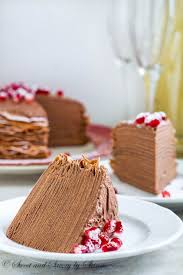 This Beautiful Chocolate Mousse Crepe Cake Is Made Of 20 Layers Of Delicate Chocolate Crepes Filled With Rich Chocolat Chocolate Crepes Sweet Cakes Crepe Cake
