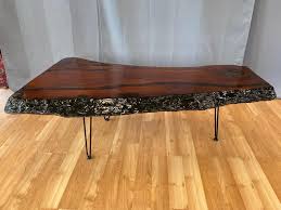 The differences that set a live edge slab apart from other wood slabs lie in the aesthetics of the slab top, the visual appearance of the grain, and the edge of the slab. Large Live Edge Redwood Slab Coffee Table On Hairpin Legs 1970s For Sale At 1stdibs