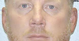 Murder suspect's ex-wife faces tough questions