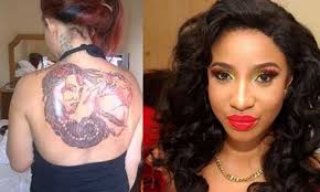 Timini egbuson, but the gorgeous actress denied sleeping with her bestie and movie industry colleague, timini egbuson. Jesus Loves Your Tattoos Celebrity Tattooist Bizzyaski Assure Tonto Dikeh