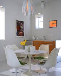 The tulip table, a unique, elegant design with wonderfully natural curves and a choice of beautiful top finishes, a creative masterpiece of a design from eero saarinen.if you had no idea and were asked when you thought this table was designed, would you guess the 1950's? Saarinen Tulip Table A Design Classic Perfect For Contemporary Interiors