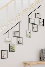 personaliseer je huis met foto s familiefoto muren fotowand trap trappenhuis decoratie