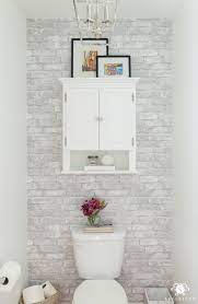 Decorating a small space can be a challenge since the room can get cluttered quickly. Toilet Room Makeover Reveal And Clever Bathroom Storage Kelley Nan
