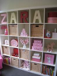 A collection shelf in your study room, a clothes organizer in your bedroom, a display shelf in entryway, and a toy storage solution in kids room 2. She Buys Storage Cube Shelves Uses Them In Clever New Ways Around The House Girls Room Storage Kids Room Toy Rooms