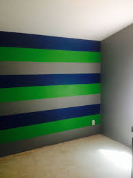 Just Painted My 14 Yr Old Son S Room Seattle Seahawks Colors Sparkling Apple Behr Royal Breeze Behr Boys Bedroom Colors Boys Bedroom Green Boy Room Paint