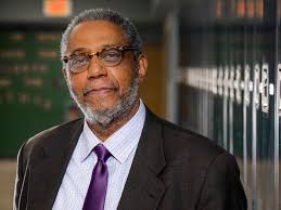 High school principal by day, Walmart stocker at night